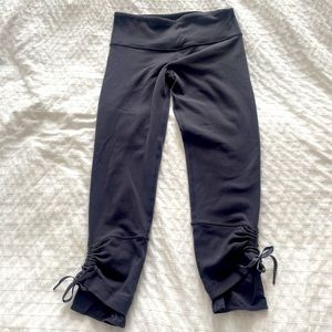Luluemon Gray yoga crops. Size 4 Mesh layer at hem with drawstring to customize.